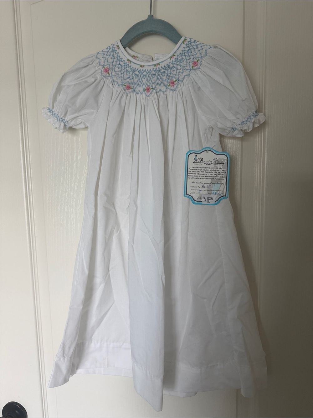 White Smocked Girls' Dress with Blue & Pink Embroidery